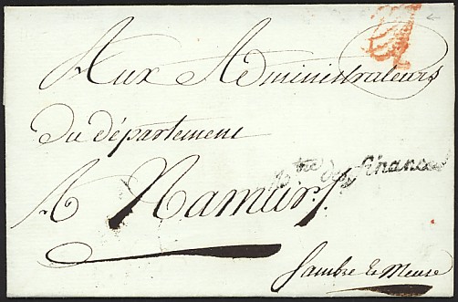 Le timbre rouge de vérification des ports apposé sur les lettres en franchises
