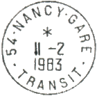 Timbre à date au type A9 avec mention : numéro de département + nom de ville + "GARE" / "- TRANSIT -" /
